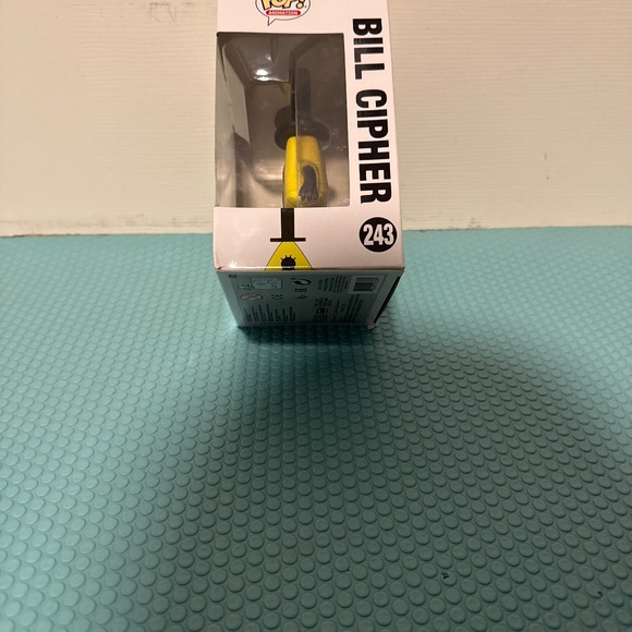 Bill cipher funko pop, lightly scratched, I haven't opened it yet. - Picture 2 of 4